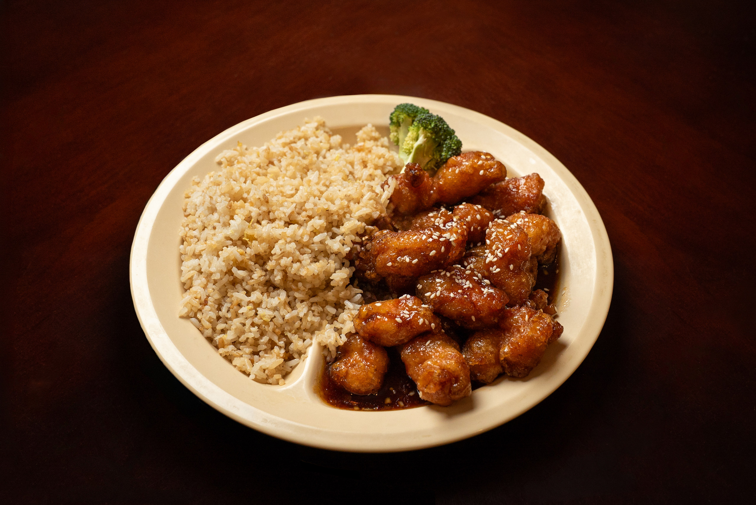 Sesame chicken with steamed rice and broccoli — Denver restaurant food photography